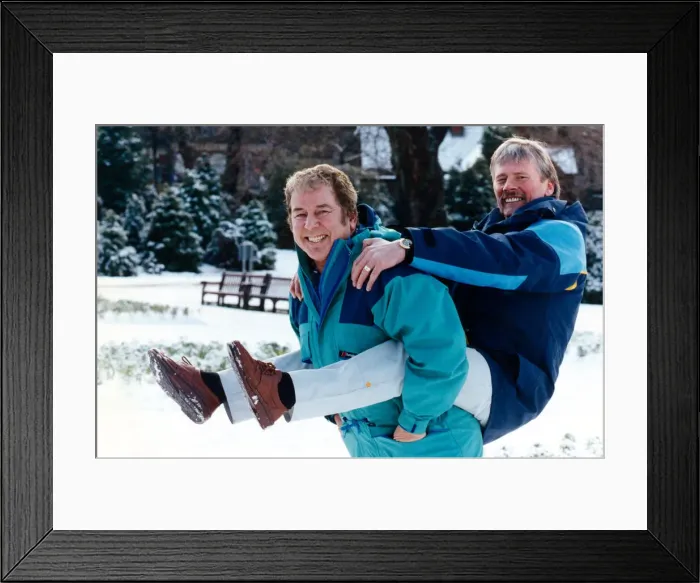 Framed Print : Folk singer Jimmie Macgregor (left) giving a piggy back to cartoonist Malky McCormack Framed Print : Folk singer Jimmie Macgregor (left) giving a piggy back to cartoonist Malky McCormack