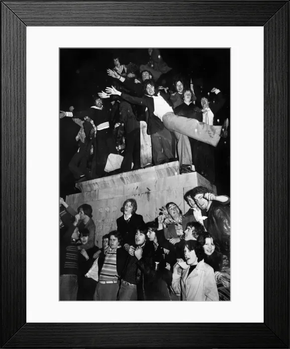 Framed Print : New Year revellers besiege the statue of Lady Godiva during the celebrations to see in