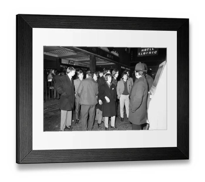 Framed Print : New Year revellers chat with the police outside the Hotel Leofric. 31st December 1971