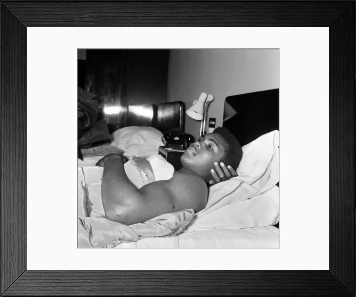 Framed Print : Cassius Clay aka (Muhammad Ali) catches up on some sleep in the Piccadilly Hotel Framed Print : Cassius Clay aka (Muhammad Ali) catches up on some sleep in the Piccadilly Hotel