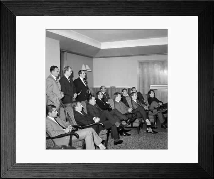 Framed Print : England team training session at Roehampton. The players sit to watch a film shot