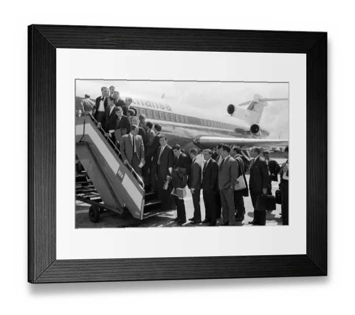 Framed Print : The England football team board their plane as they leave London airport for Frankfurt