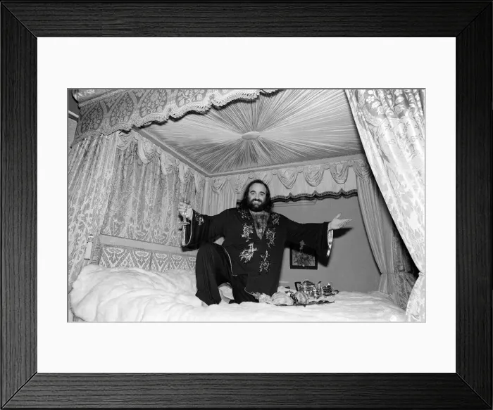 Framed Print : Demis Roussos November 1977 Perched on his mink covered bed which cost 30