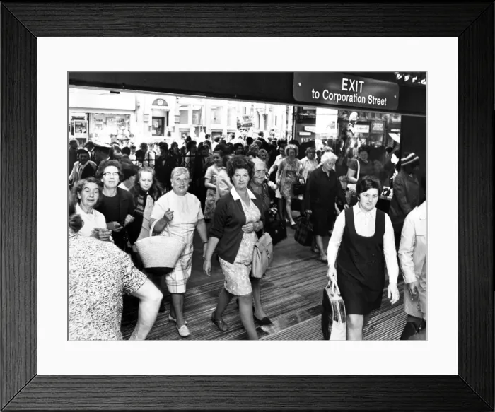 Framed Print : Crowds of people rushing through the doors of the new C&A store on the day it opened