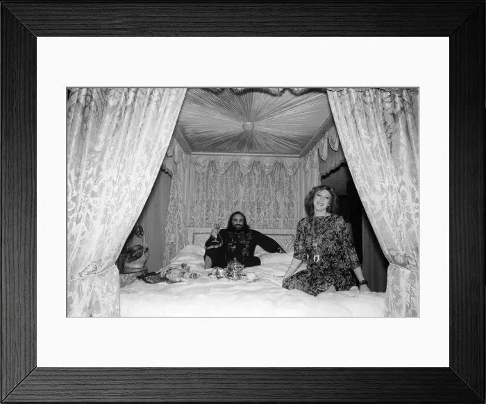 Framed Print : Demis Roussos November 1977 Perched on his mink covered bed which cost 30 Framed Print : Demis Roussos November 1977 Perched on his mink covered bed which cost 30