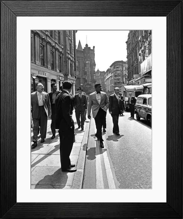 Framed Print : Cassius Clay (Muhammad Ali) (centre) in London England ahead of his next fight Framed Print : Cassius Clay (Muhammad Ali) (centre) in London England ahead of his next fight
