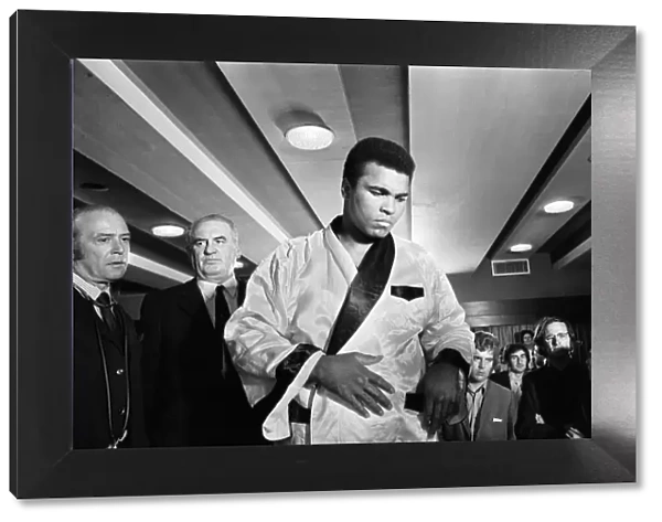 Muhammad Ali at a press conference prior to his fight with Alvin Lewis, aka Blue Lewis