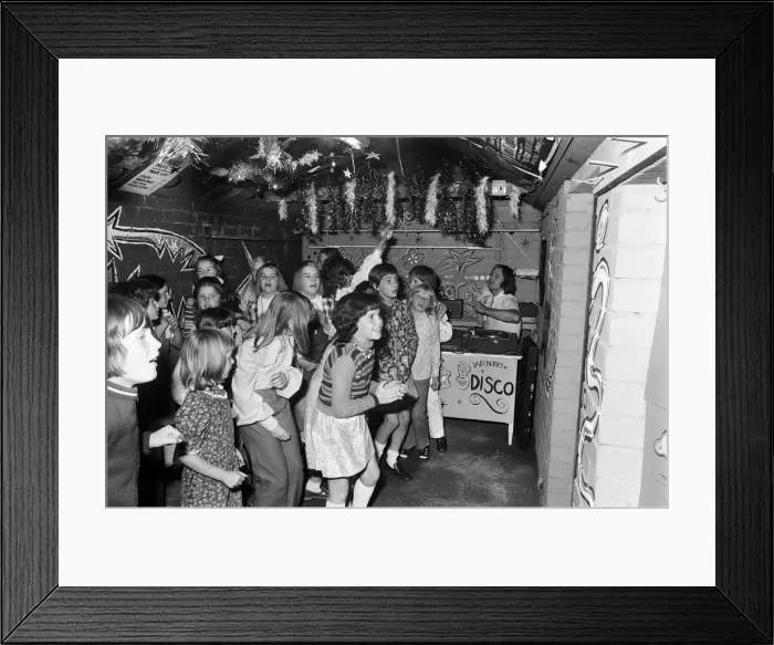 Framed Print : Pete Waterman, DJ at Garage disco in Coundon, Coventry. 7th August 1973 Framed Print : Pete Waterman, DJ at Garage disco in Coundon, Coventry. 7th August 1973