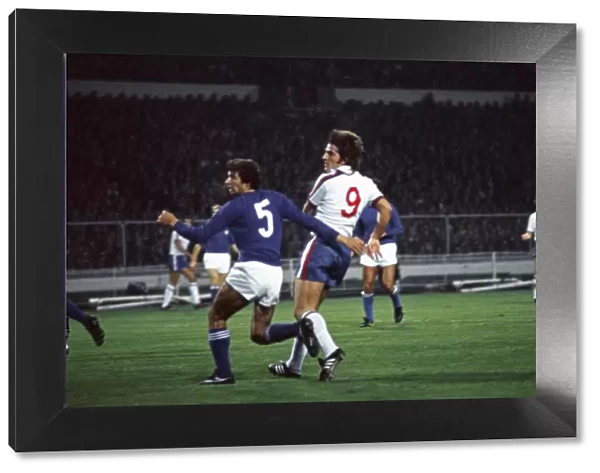 Everton footballer Bob Latchford in action for England in the international match against