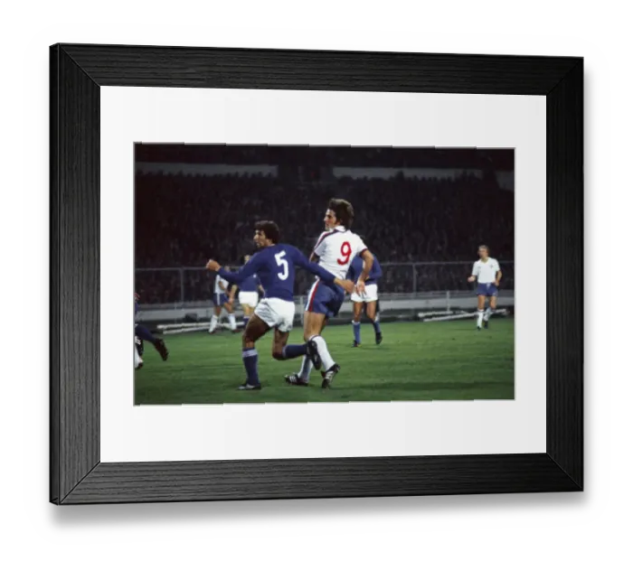 Framed Print : Everton footballer Bob Latchford in action for England in the international match against