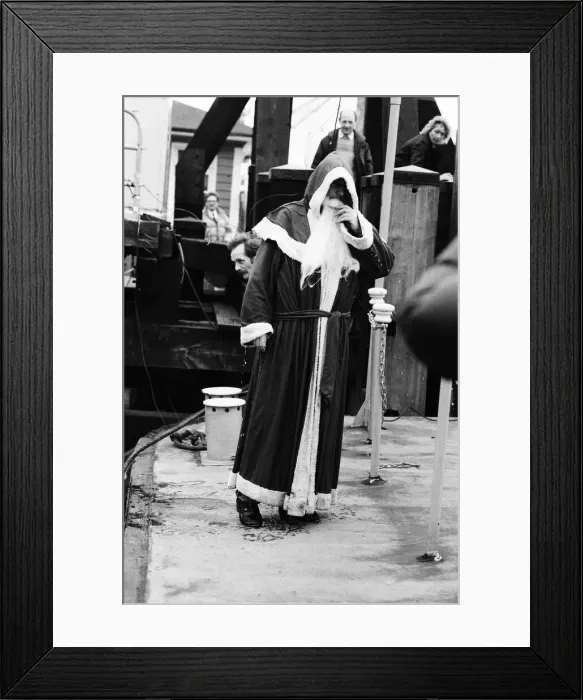 Framed Print : Father Christmas was on his way to a party in aid of Framed Print : Father Christmas was on his way to a party in aid of