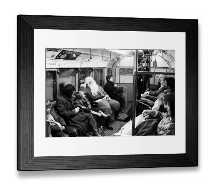 Framed Print : Father Christmas, of Bentalls Store, Ealing, takes the tube to pick up his sleigh Framed Print : Father Christmas, of Bentalls Store, Ealing, takes the tube to pick up his sleigh