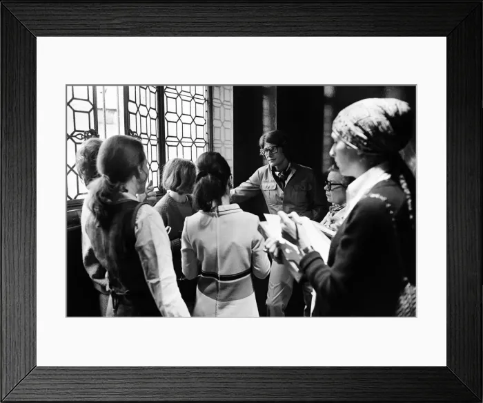 Framed Print : Yves Saint Laurent, designer, pictured speaking with journalists at the opening of his Framed Print : Yves Saint Laurent, designer, pictured speaking with journalists at the opening of his
