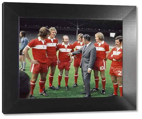 Harold Shepherdson (England and Middlesbrough trainer) talks with the Brough players