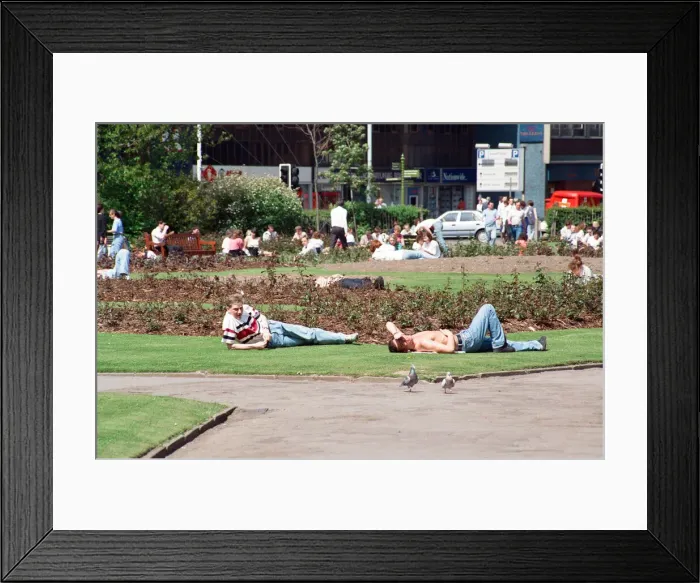 Framed Print : People sunbathing in Victoria Gardens, Middlesbrough. 14th May 1992