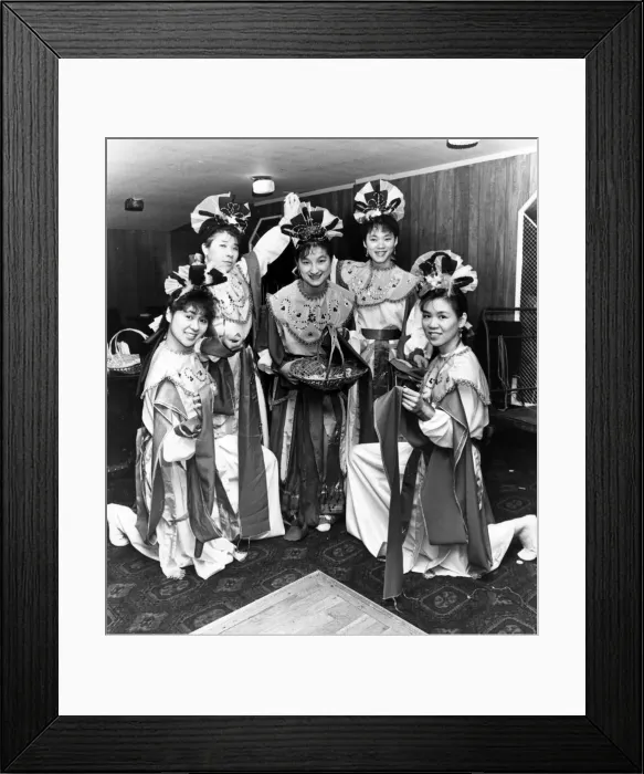 Framed Print : Chinese girls perform the Fairys Flower Dance at the New Year Celebrations held Framed Print : Chinese girls perform the Fairys Flower Dance at the New Year Celebrations held