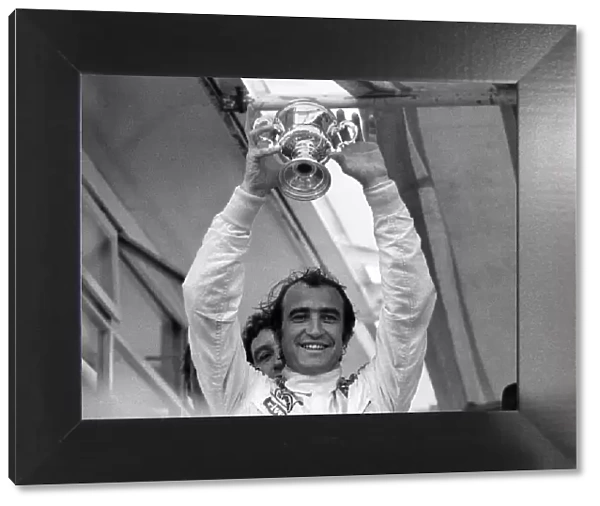 1971 Race of Champions at Brands Hatch. Winner Clay Regazzoni holds aloft