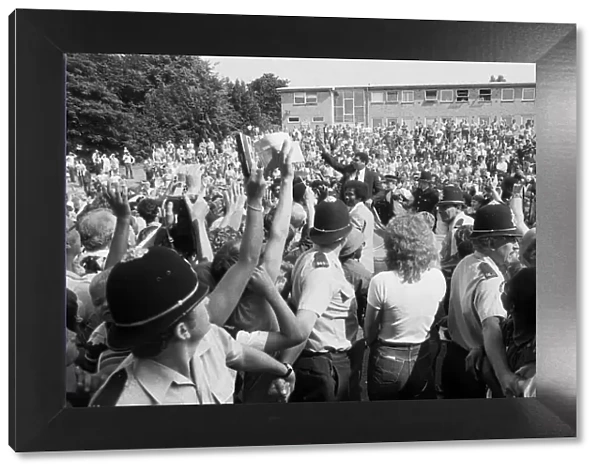 Muhammad Ali mobbed by fans in Dudley, Birmingham. 11th August 1983