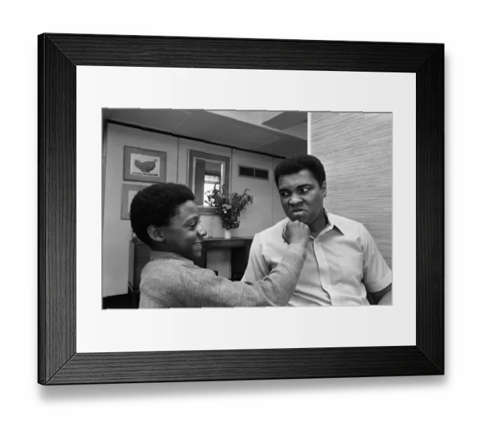 Framed Print : Muhammad Ali with a young fan at the Albany Hotel in Birmingham. 1st May 1984
