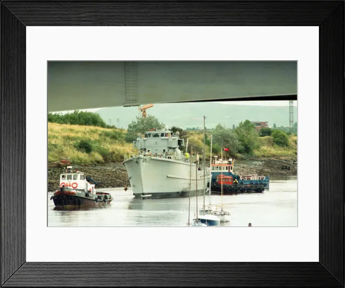 Framed Print : Former Navy Minehunter HMS Kellington being towed underneath the Princess of Wales Bridge