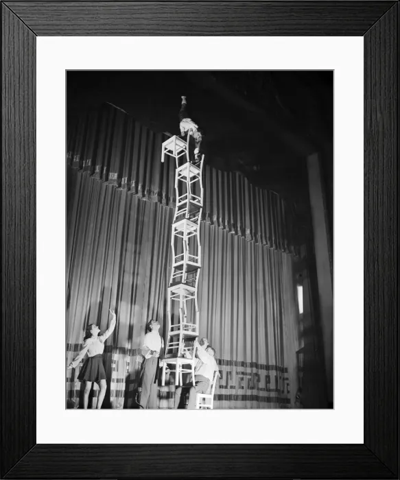 Framed Print : The Five Furres, performing one of their balance acts with chairs. 10th February 1953 Framed Print : The Five Furres, performing one of their balance acts with chairs. 10th February 1953
