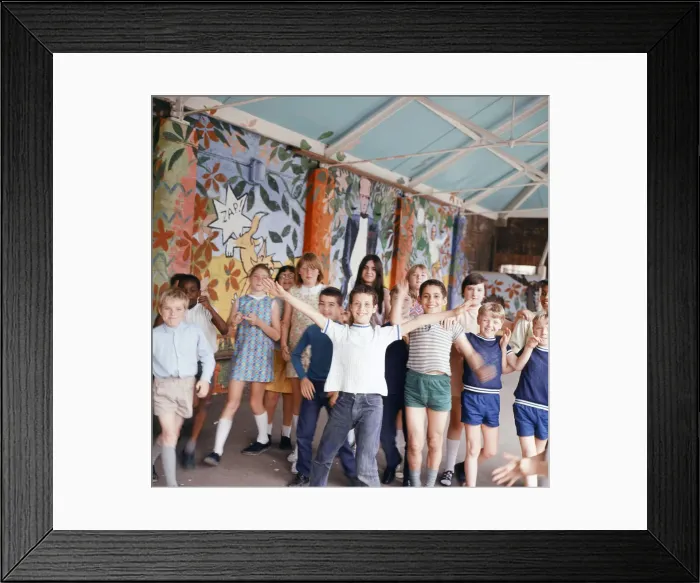 Framed Print : Children of Hargrave Park Junior School playing in their newly decorated playground Framed Print : Children of Hargrave Park Junior School playing in their newly decorated playground