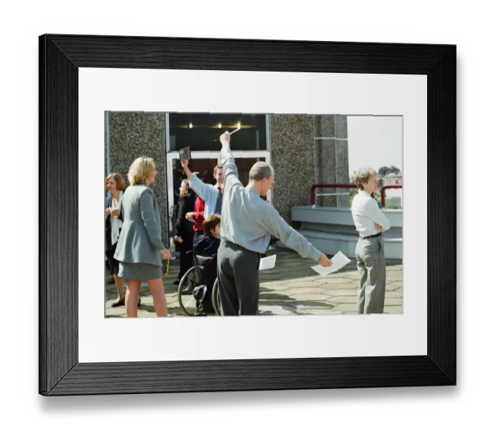 Framed Print : People watching a total solar eclipse at the Civic Centre, Reading. 11th August 1999