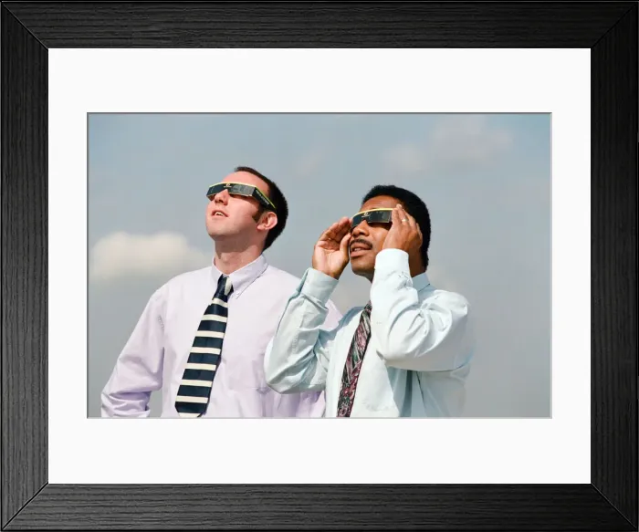 Framed Print : People watching a total solar eclipse at the Civic Centre, Reading. 11th August 1999 Framed Print : People watching a total solar eclipse at the Civic Centre, Reading. 11th August 1999