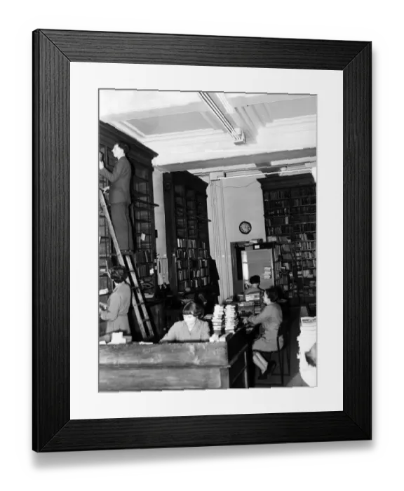 Framed Print : This is part of the Lending Library that the public rarely see, always a hive of activity