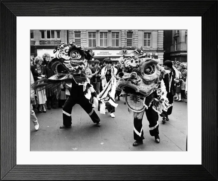 Framed Print : New Year Chinese style. A festive Dragon dance underway at Greys Monument, Newcastle Framed Print : New Year Chinese style. A festive Dragon dance underway at Greys Monument, Newcastle