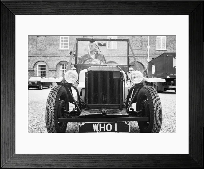 Framed Print : John Pertwee as Dr Who, seen with Bessie the Doctor