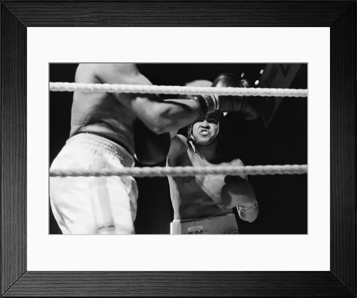 Framed Print : Muhammad Ali having fun with a spectator at boxing exhibition match in Birmingham Framed Print : Muhammad Ali having fun with a spectator at boxing exhibition match in Birmingham