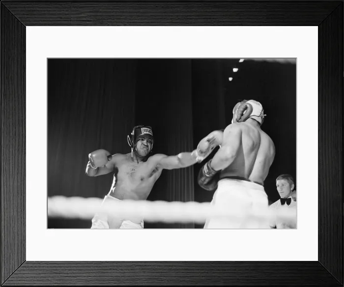 Framed Print : Muhammad Ali having fun with a spectator at boxing exhibition match in Birmingham