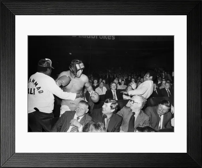 Framed Print : Muhammad Ali having fun with a spectator at boxing exhibition match in Birmingham Framed Print : Muhammad Ali having fun with a spectator at boxing exhibition match in Birmingham