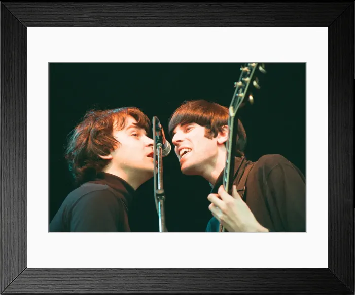 Framed Print : A 60s and 70s concert featuring look-a-like bands Beatlemania