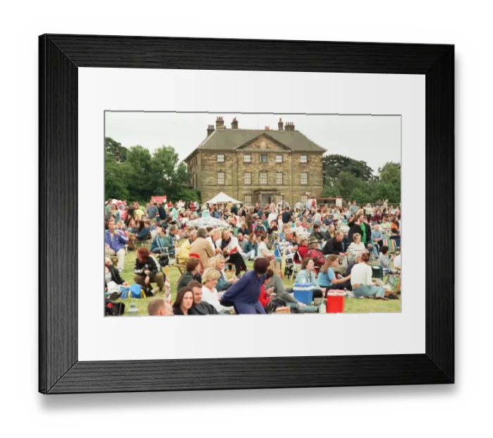 Framed Print : A 60s and 70s concert featuring look-a-like bands Beatlemania