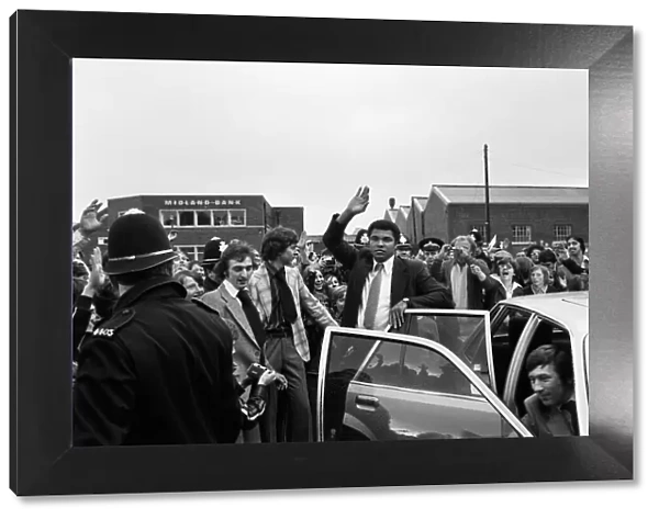 Muhammad Ali waving to fans in Birmingham. 7th June 1979