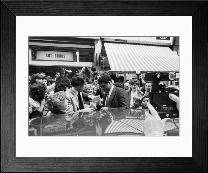 Framed Print : Muhammad Ali signing autographs outside the Odeon in Birmingham. 7th June 1979 Framed Print : Muhammad Ali signing autographs outside the Odeon in Birmingham. 7th June 1979