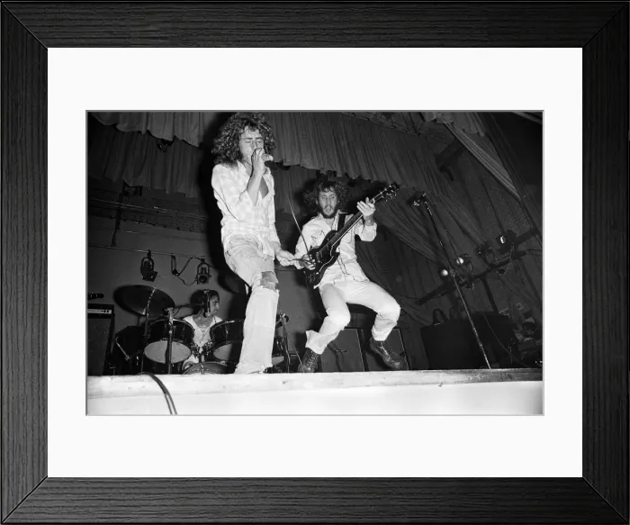 Framed Print : British rock group The Who performing on stage during a concert at the University of