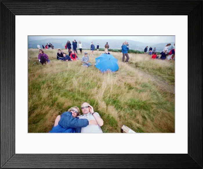 Framed Print : People watching a total solar eclipse, Caerphilly mountain. 11th August 1999 Framed Print : People watching a total solar eclipse, Caerphilly mountain. 11th August 1999