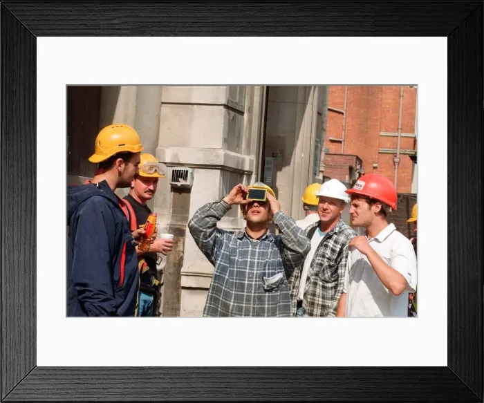Framed Print : People watching a total solar eclipse, Queen Street, Cardiff. 11th August 1999 Framed Print : People watching a total solar eclipse, Queen Street, Cardiff. 11th August 1999