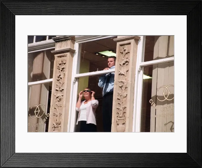 Framed Print : People watching a total solar eclipse, Queen Street, Cardiff. 11th August 1999 Framed Print : People watching a total solar eclipse, Queen Street, Cardiff. 11th August 1999