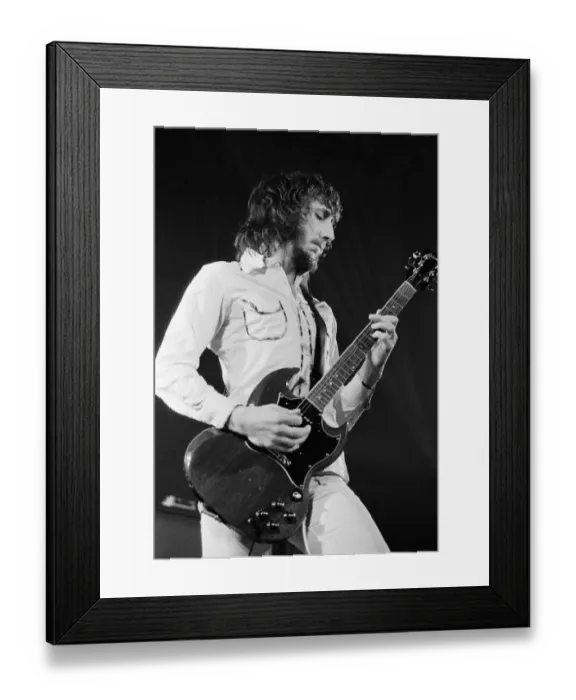 Framed Print : British rock group The Who performing on stage during a concert at the University of