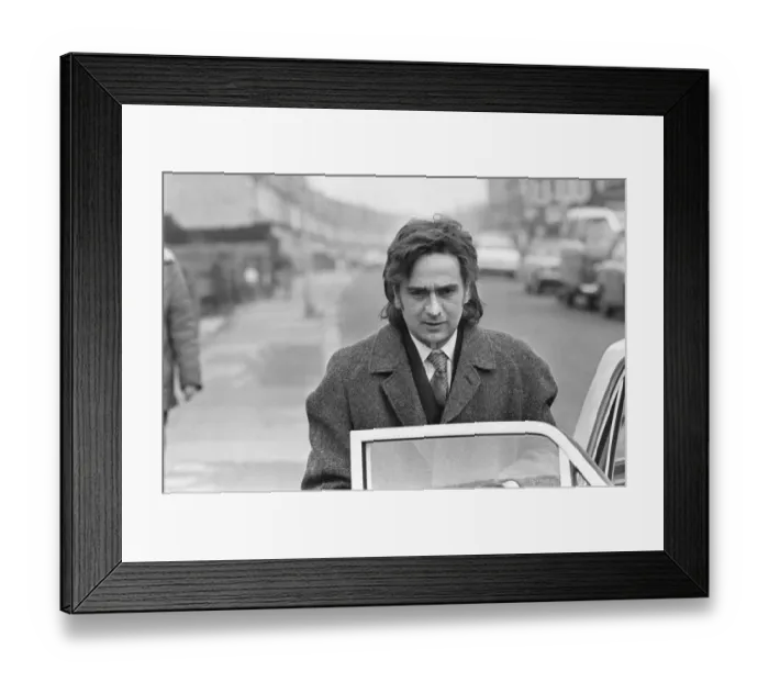 Framed Print : Dudley Moore gets into a car after removing his make-up during o filming a BBC comedy Framed Print : Dudley Moore gets into a car after removing his make-up during o filming a BBC comedy