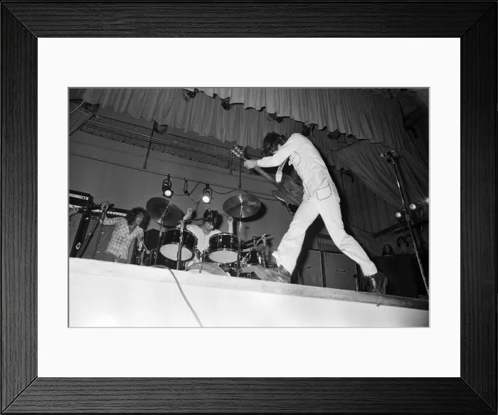 Framed Print : British rock group The Who performing on stage during a concert at the University of