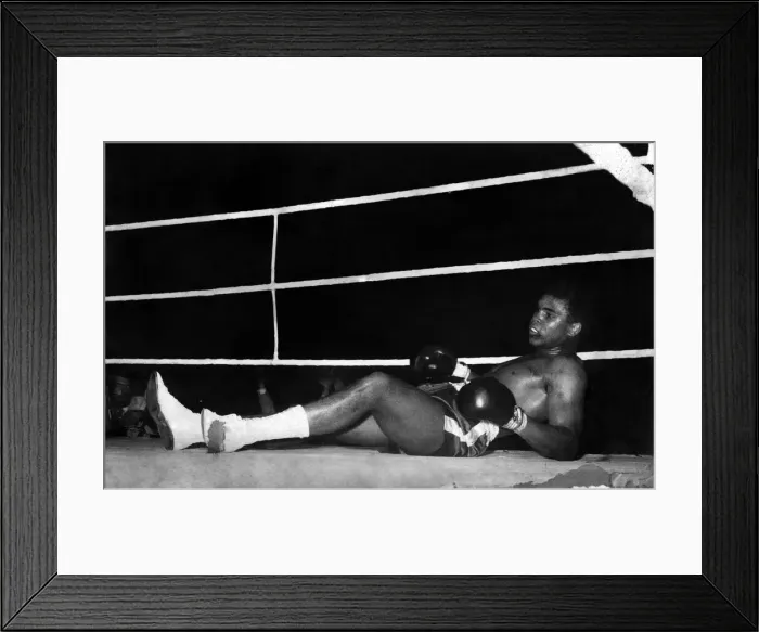 Framed Print : Action during the non-title heavyweight fight between American Cassius Clay