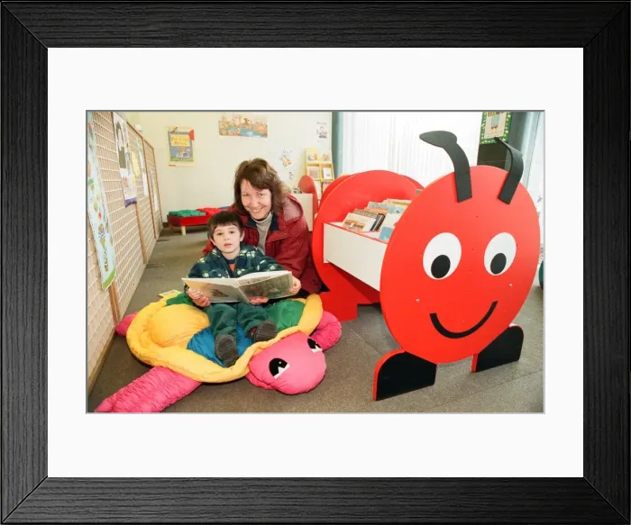Framed Print : Jacqueline Collantine with Jonathan, 2, in the new children Framed Print : Jacqueline Collantine with Jonathan, 2, in the new children