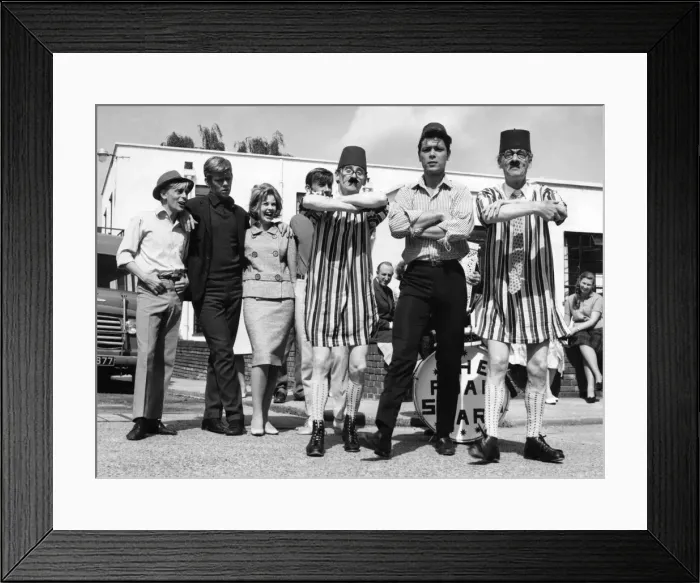 Framed Print : Recognise the hatted busker'? Its Cliff Richard