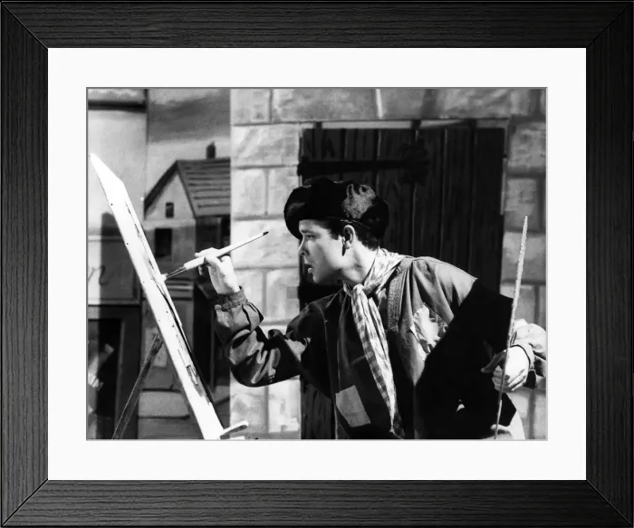 Framed Print : Its Cliff - The Young Master: The serious young artist facing up to a canvas is Framed Print : Its Cliff - The Young Master: The serious young artist facing up to a canvas is