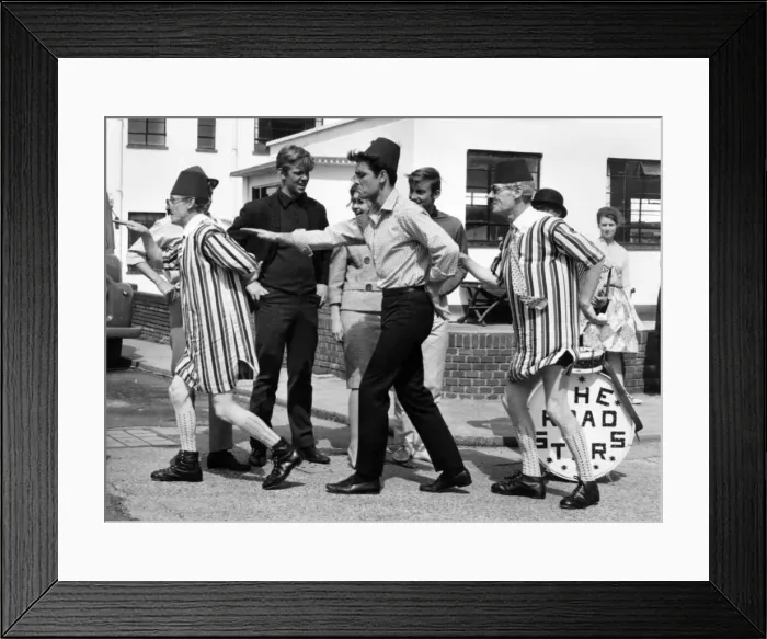 Framed Print : Recognise the hatted busker'? Its Cliff Richard